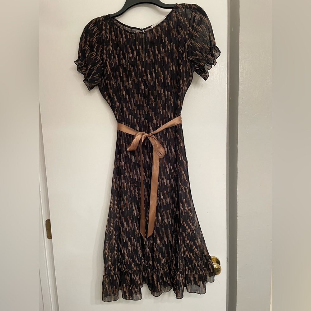Sandra Darren black and gold dress with bronze ribbon belt.